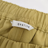 qualite ポリエステルイージースリットパンツ 2WAYストレッチセンターベンツパンツ パンツ マスタード レディース カリテ【中古】5-0419G∞