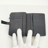 genten カットワークレザー 革 小銭入れあり 二つ折り財布 ブラック レディース ゲンテン【中古】6-0628G∞